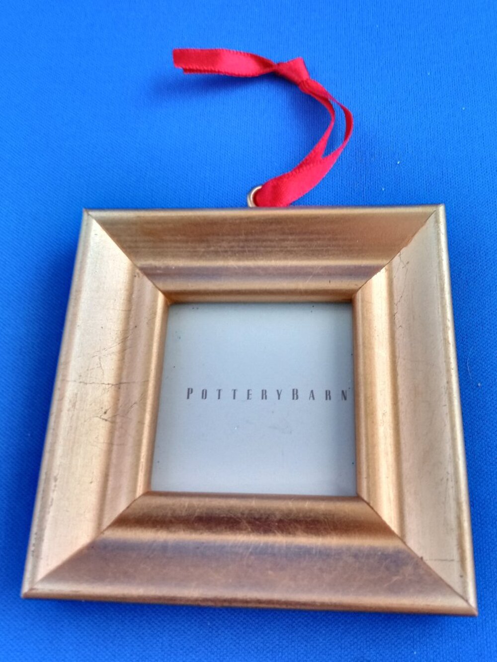 Pottery Barn small gold frame on red ribbon hanger ornament